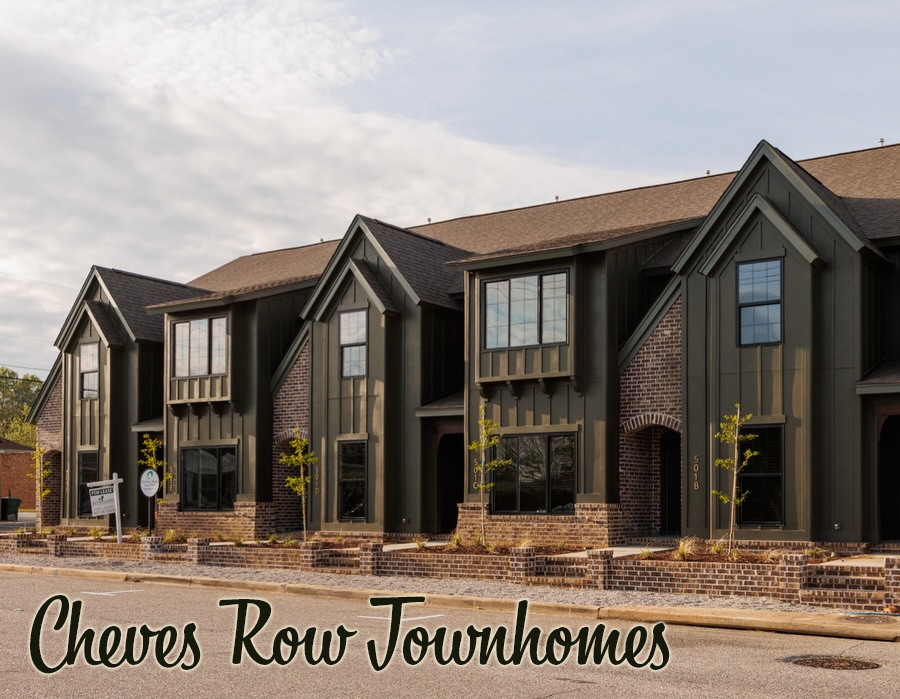 Six two-story townhomes with green facades located in the 500 block of W. Cheves Street